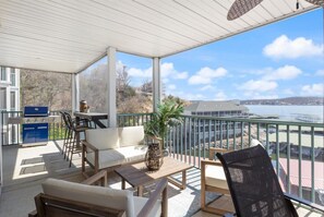 Outdoor dining - Serene Dreams - Waterfront, Lakeside Pool & More! (Lake Ozark)
