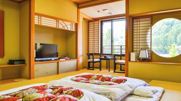 Comfort Quadruple Room | In-room safe, individually decorated, desk, free WiFi