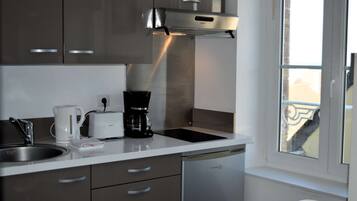 Fridge, microwave, coffee/tea maker, toaster