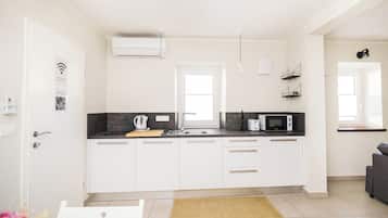 Fridge, microwave, toaster, cookware/dishes/utensils