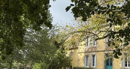 Mansion with shared pool in enclosed park