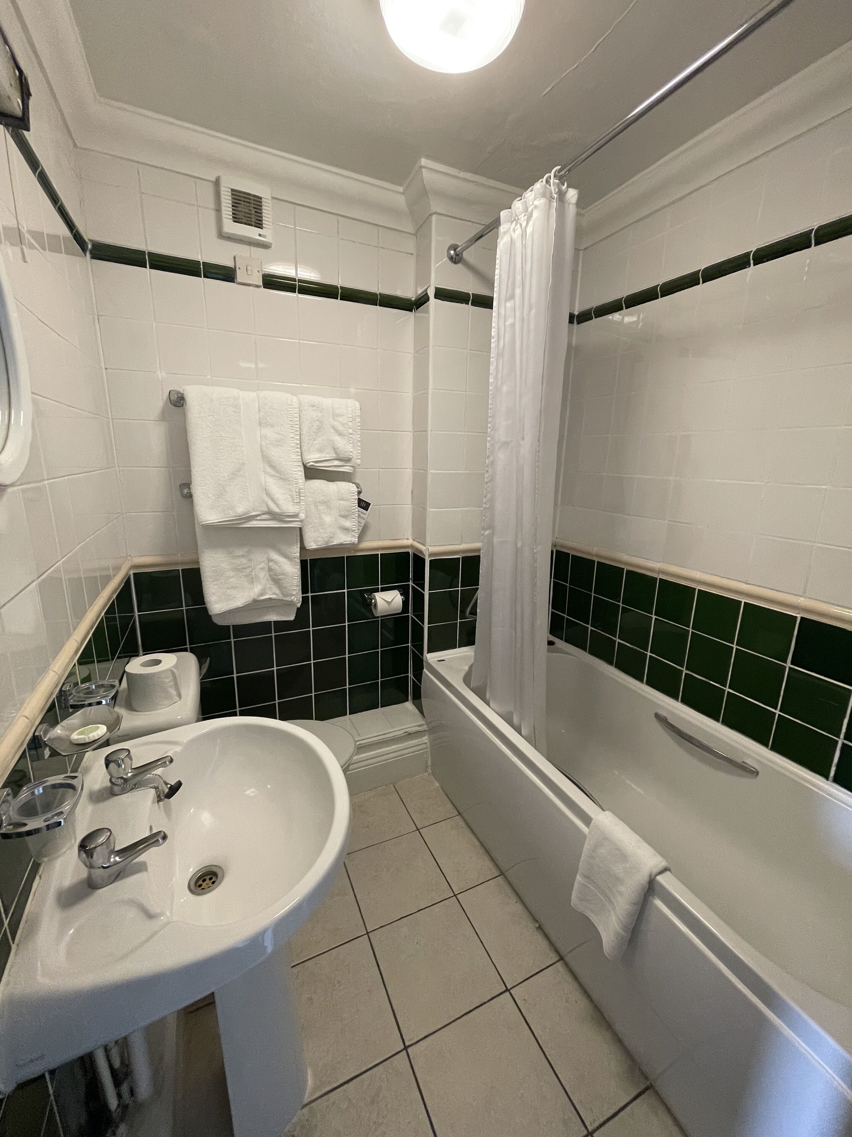 Hair dryer, towels, soap, shampoo