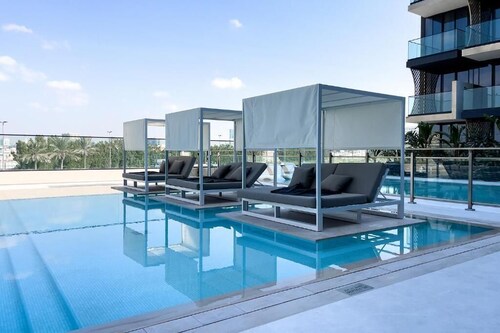 Luxe 1BR 15Mins- Beach Best Infinity Pool -Jumeirah Village Circle ,JVC 