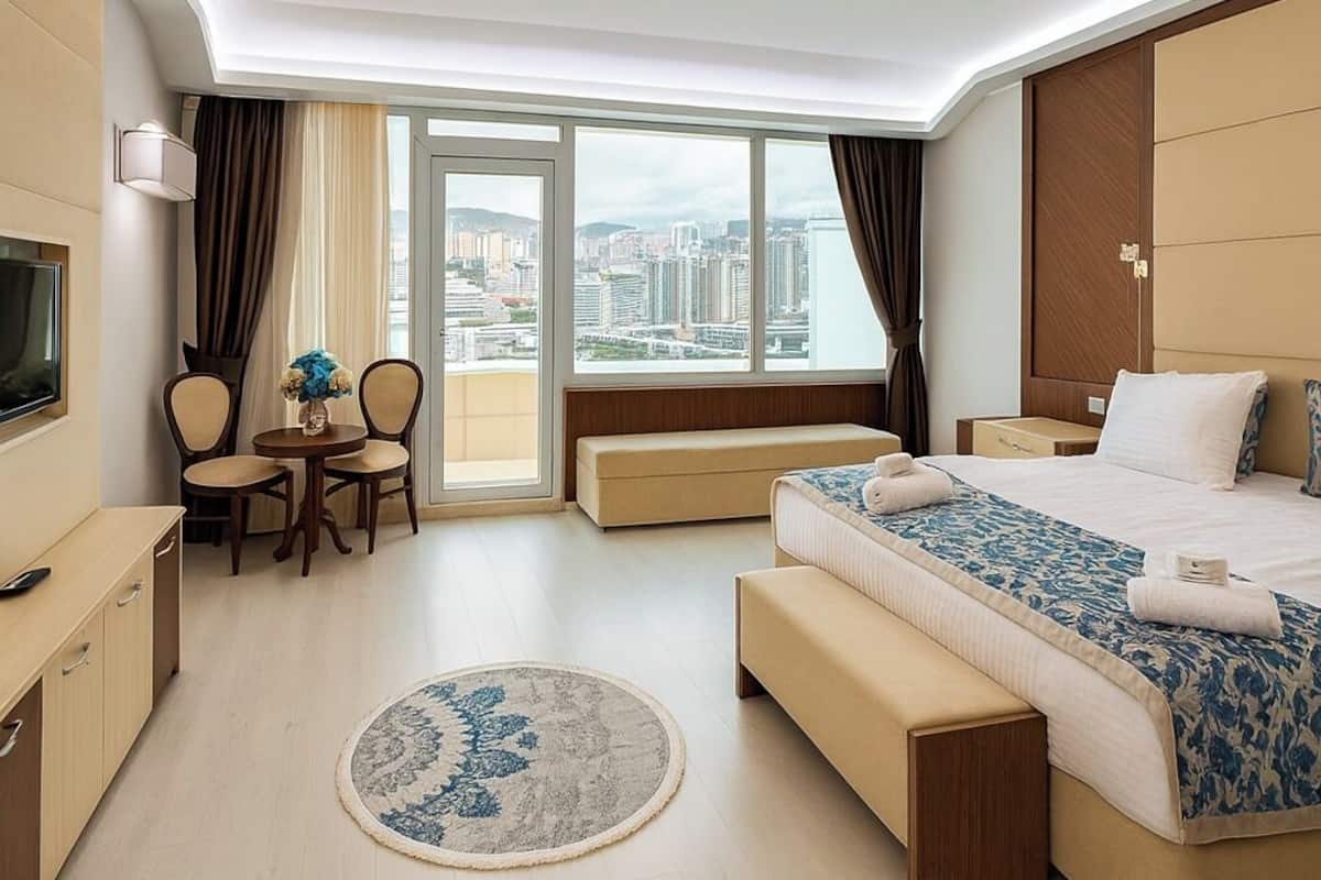 Royal suite, balkon | 2 slaapkamers, verduisterende gordijnen, geluiddichte muren