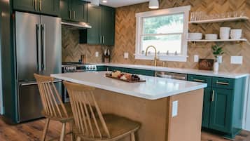Coffee/tea maker, fridge, microwave, oven