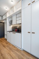 Comfort Single Room, City View | Private kitchen | Fridge, stovetop, coffee/tea maker, electric kettle