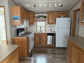 Private kitchen - Cozy lake cottage with great deck, near all Point Sebago resort activities! (Casco)