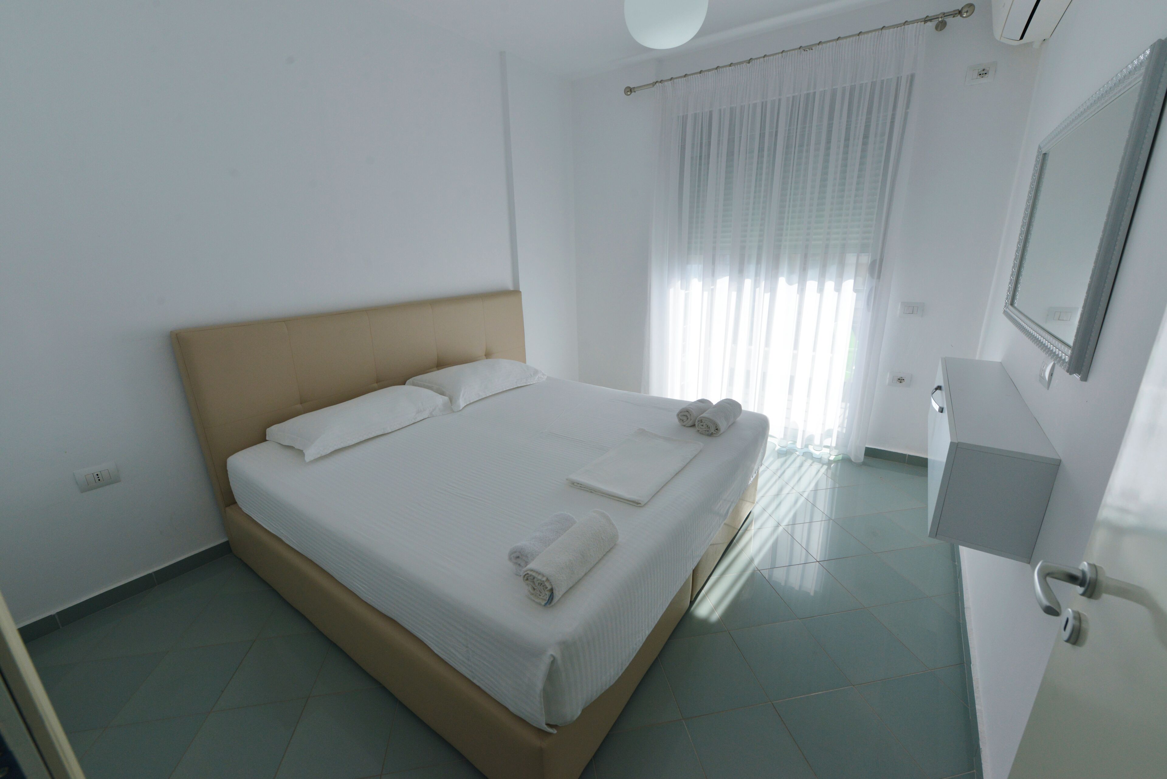 Apartment, 1 Bedroom, Balcony, Sea View | Down comforters, desk, soundproofing, free WiFi