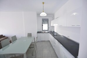 Comfort Apartment, 2 Bedrooms, Kitchen, Sea View | Private kitchen | Mini-fridge, oven, cookware/dishes/utensils, freezer - ApartHotel Miramare Sarande (Sarandë)