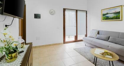 Holiday Home 'Il Corbezzolo Apartment' with Shared Terrace, Wi-Fi and Air Conditioning