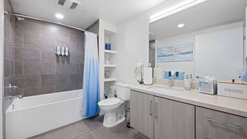 Shower, hair dryer, towels, soap