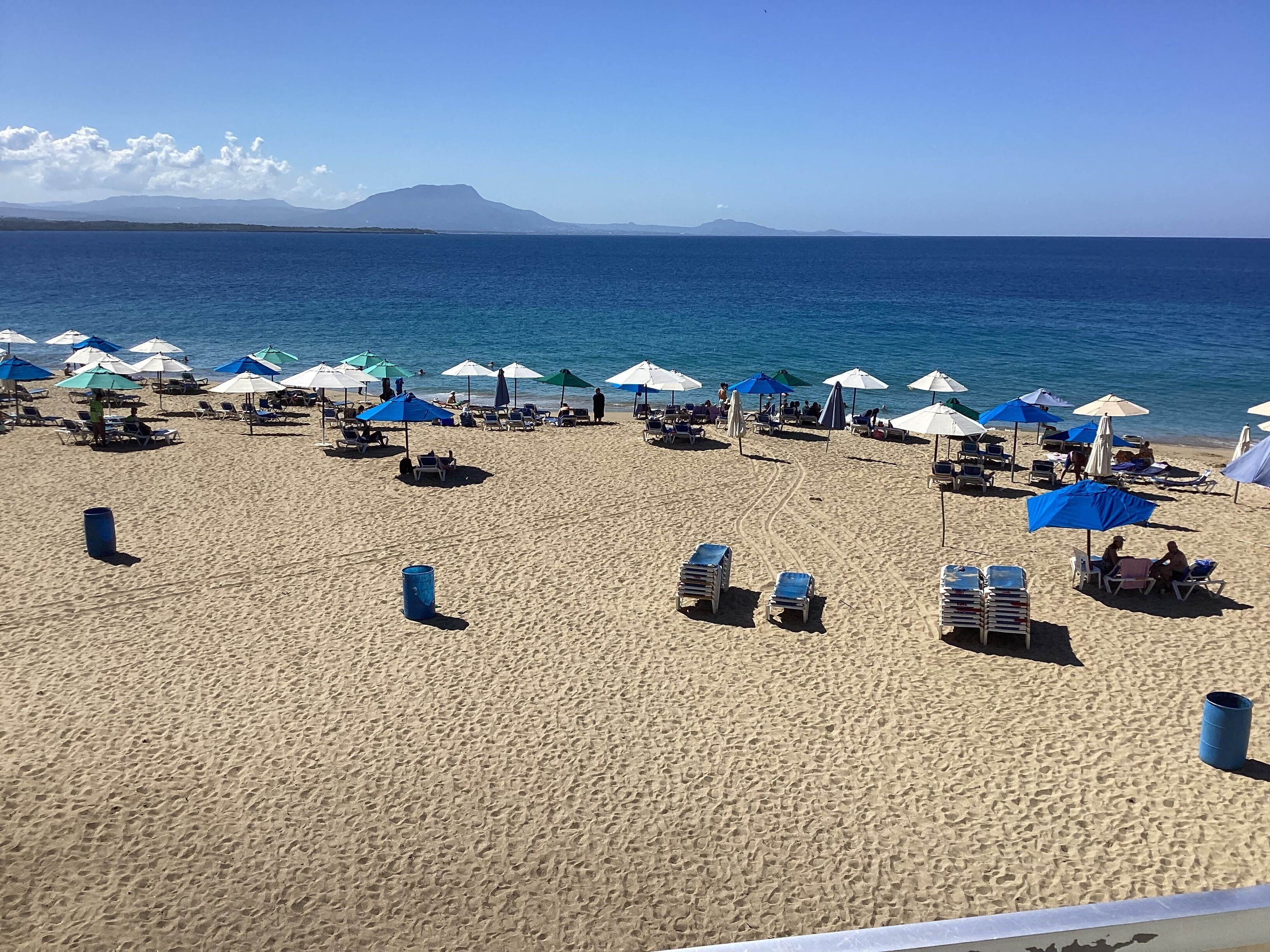 On the beach, sun loungers, beach towels