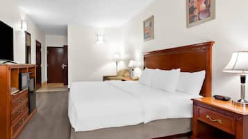 Premium bedding, desk, laptop workspace, iron/ironing board