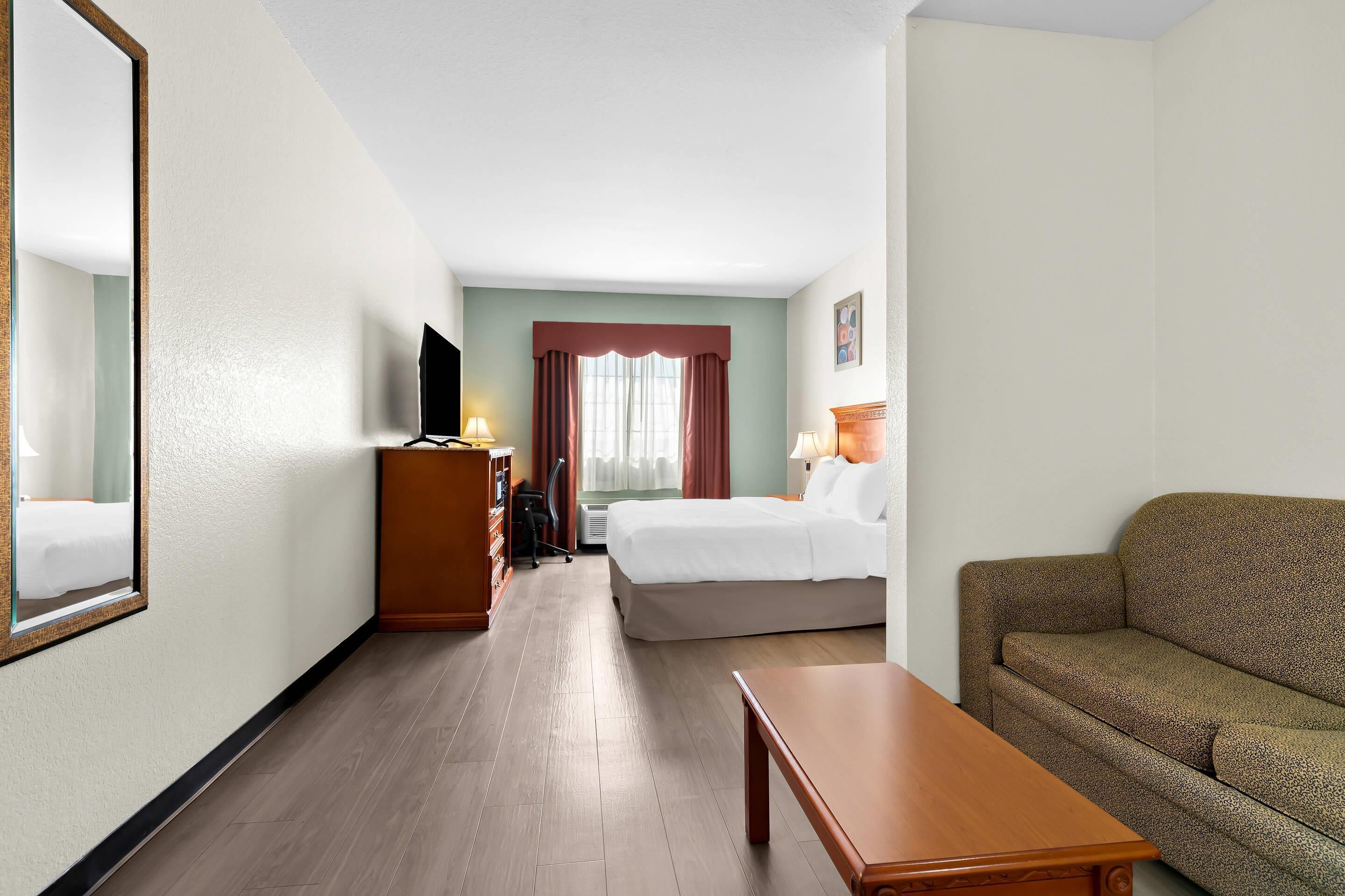 Premium bedding, down comforters, desk, laptop workspace