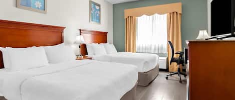 Premium bedding, down comforters, desk, laptop workspace