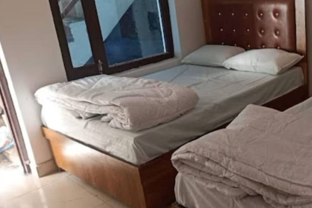 Deluxe Quadruple Room | Free WiFi, bed sheets