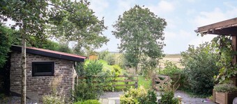 Escape to the peaceful countryside of Biervliet and embrace the serene life in this charming holiday home.