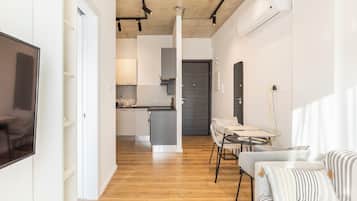 City Apartment | Living room | 42-inch Smart TV with digital channels