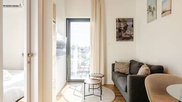 Premium Apartment | Living area | 42-inch Smart TV with digital channels