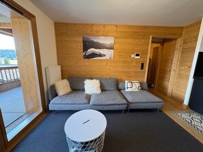 Living area - New apartment 50m², 2 bedrooms, WIFI, covered parking (Les Saisies)