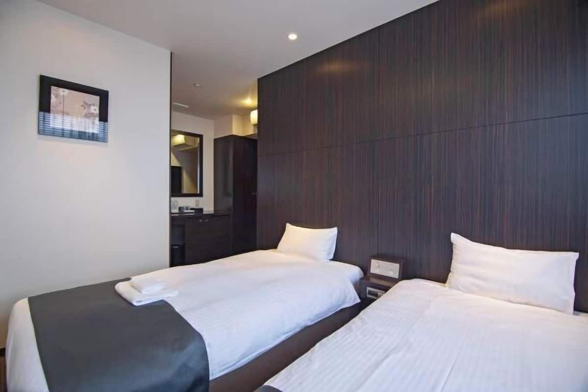 Cortinas blackout, Wi-Fi de cortesia, roupa de cama