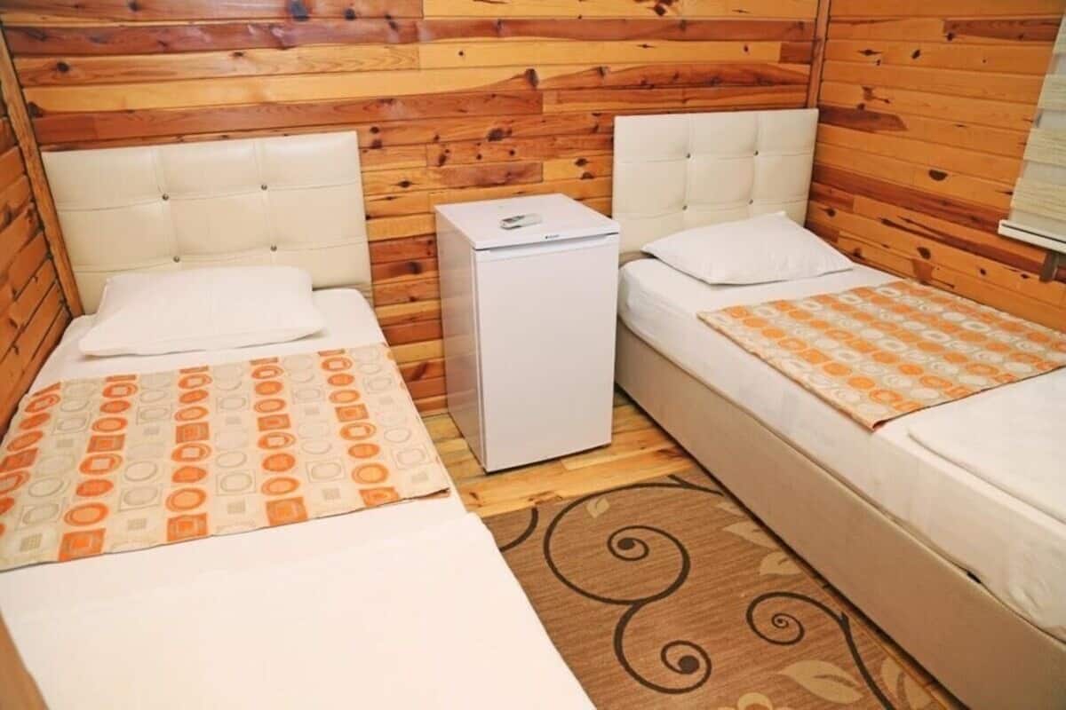 Standard Bungalow, Multiple Beds, Non Smoking, Courtyard View | 3 bedrooms, laptop workspace, soundproofing, free WiFi