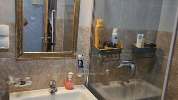 Hair dryer, towels, soap, shampoo