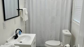 Hair dryer, towels, toilet paper