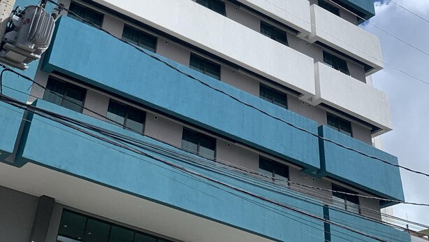 A multi-story hotel with a modern design, featuring a prominent 'W' logo on the top. - WA Hotel Fortaleza (Fortaleza)