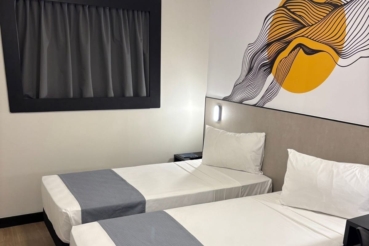 Standard Twin Room | In-room safe, desk, laptop workspace, blackout curtains