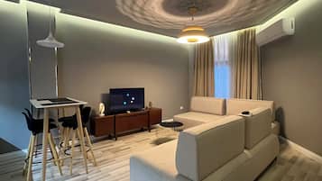 Family Apartment | Living area | 43-inch LED TV with satellite channels, printers