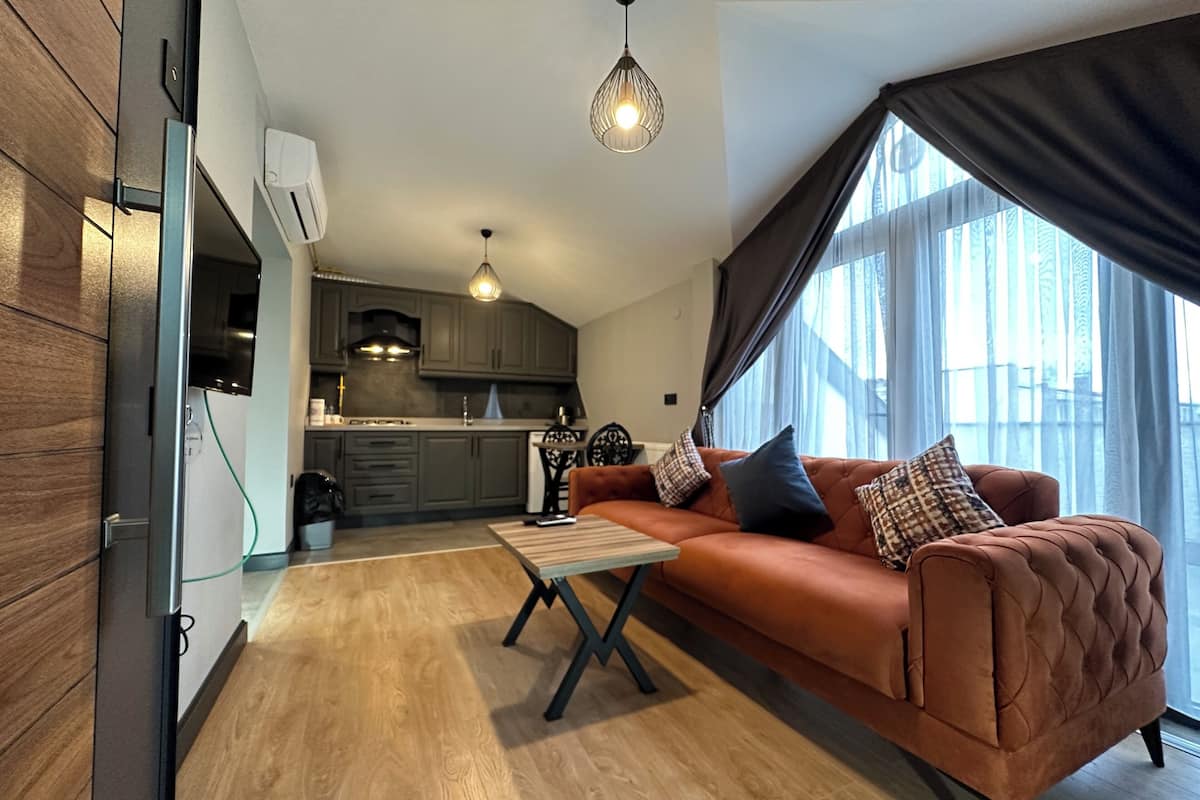 Family Loft | Living area | 24-inch Smart TV with digital channels, fireplace