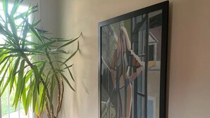 A potted plant next to a framed artwork on a wall. - BEAUTIFUL AC HOUSE WITH SWIMMING POOL AIX CENTER (Aix-en-Provence)