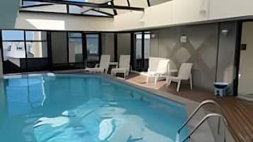 Apartment | Pool | Outdoor pool, a heated pool, pool umbrellas, pool loungers
