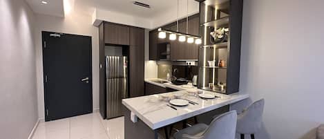 Design Apartment | Private kitchen | Full-size fridge, stovetop, electric kettle, cookware/dishes/utensils
