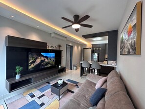 Design Apartment | Living room | 55-inch flat-screen TV with digital channels, Netflix - Design Haven Suite Subang by Icon Stay (Subang Jaya)