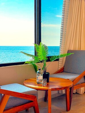 Design Room, Multiple Beds, Pool View, Oceanfront | Living area