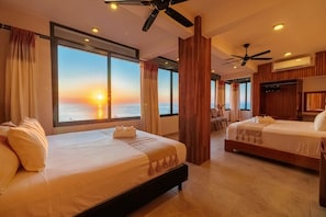 Chambre Design, plusieurs lits, vue piscine, en front de mer