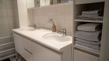 Hair dryer, towels, soap, toilet paper