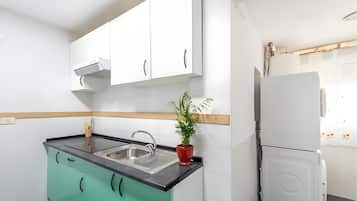 Mini-fridge, microwave, espresso maker, dining tables