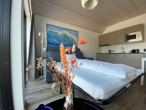 Neljän hengen perhehuone | Oleskelualue | Taulutelevisio