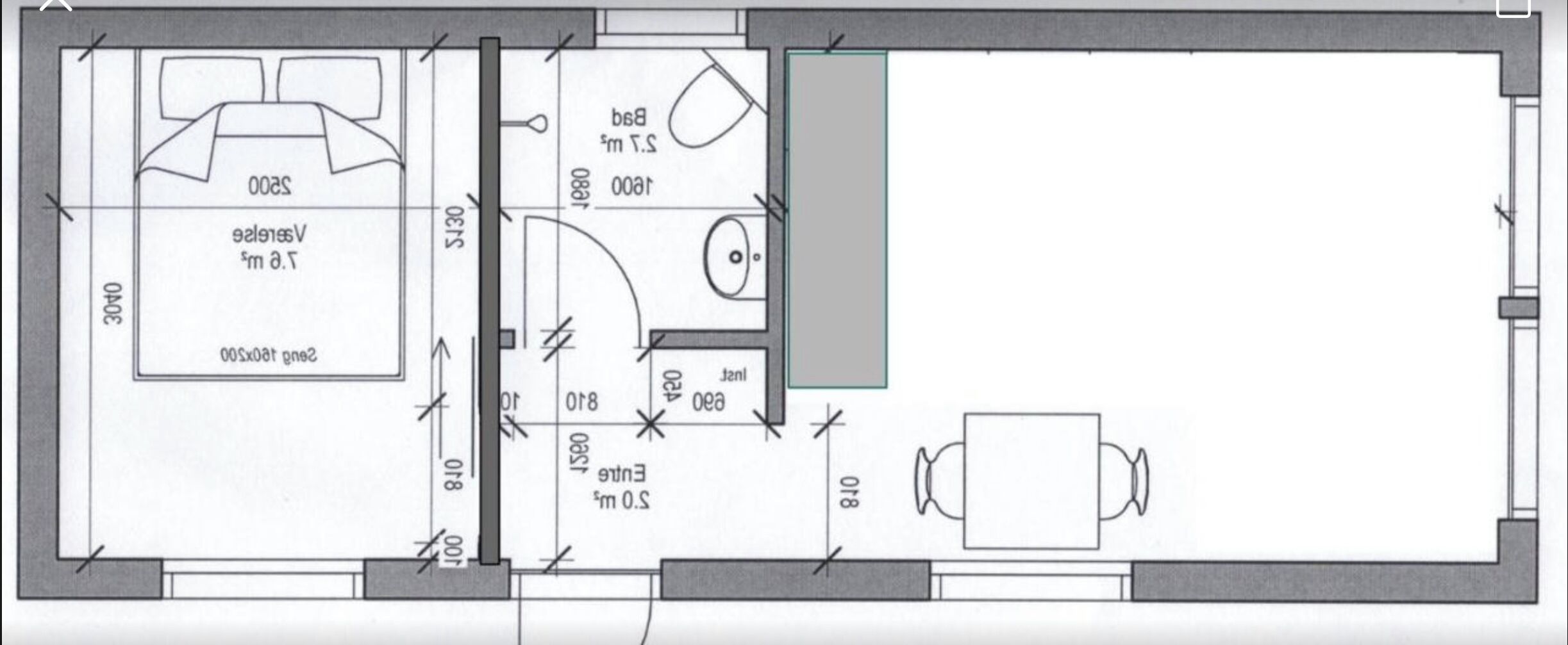 Plano de planta que muestra un dormitorio, un baño y un comedor.