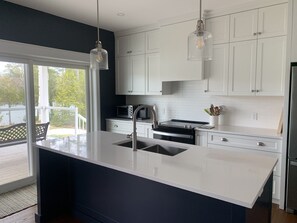 Fridge, microwave, oven, stovetop - Brand new, 4 bedroom all-season cottage on Green River. (Washago)