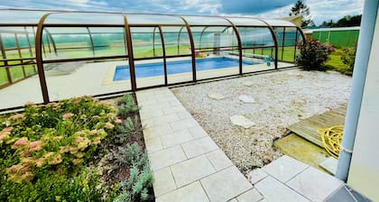 Maison spacieuse avec piscine