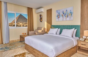 Habitación Deluxe doble | Caja fuerte, escritorio, cortinas opacas y wifi gratis