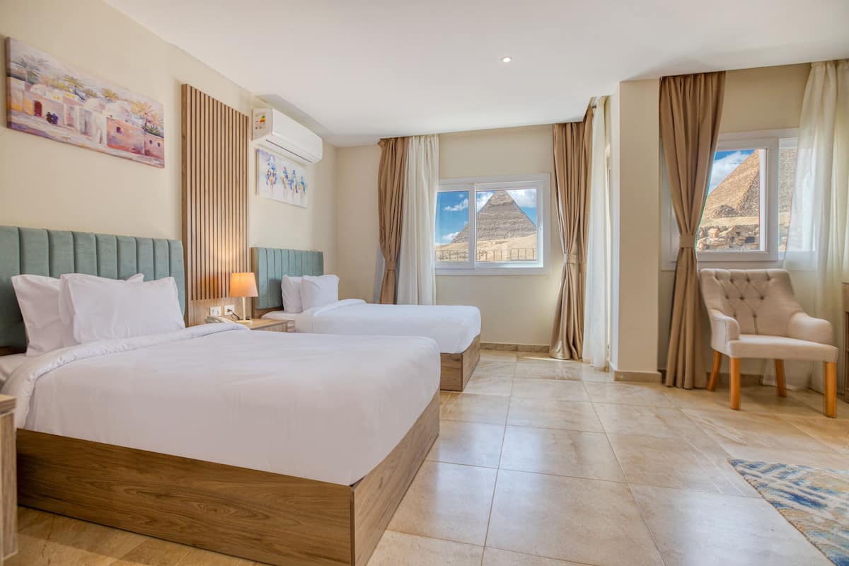 Deluxe Twin Room With Panoramic Pyramids View | In-room safe, desk, blackout drapes, free WiFi