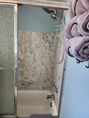 Hair dryer, towels, soap, shampoo