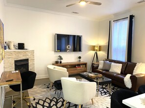 Smart TV, fireplace, books