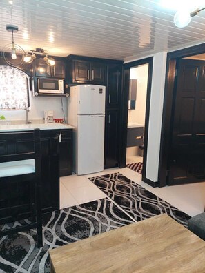 Fridge, microwave, oven, stovetop - Modern One Bedroom Apt Central Location (Guyana)