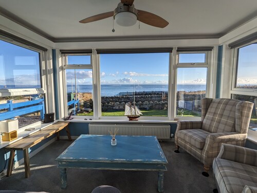 Roggle Roich - A traditional cottage with breath taking views of the sea